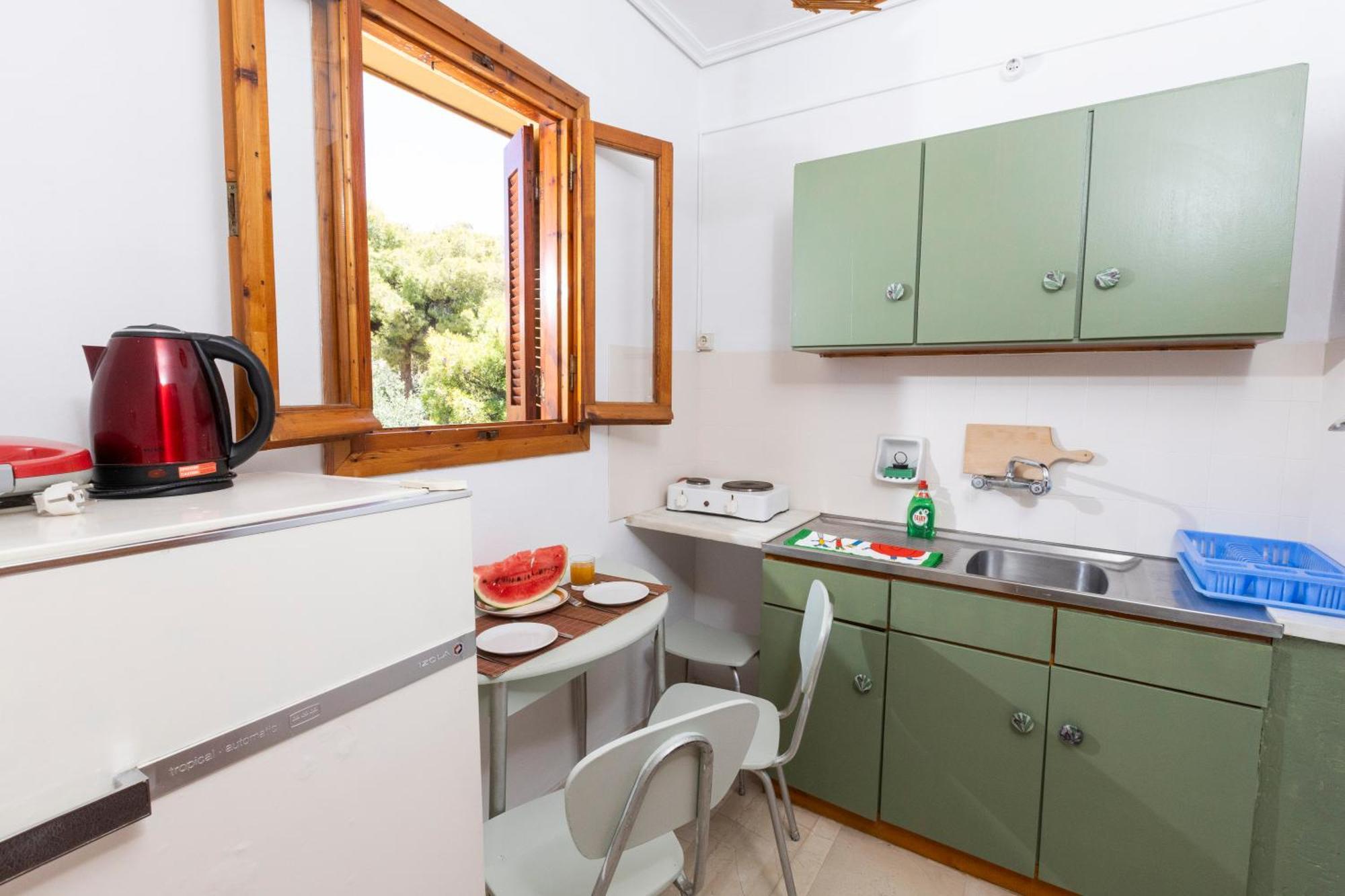 Oelia Rooms & Apartments Agia Marina  Экстерьер фото